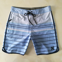 Shorts de plage pour hommes, motif floral estival, taille élastique, pantalon de plage à taille mi-haute, tricoté formel pour le surf