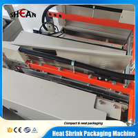 Machine d'emballage thermorétractable automatique à scellage latéral pour boîtes à outils, matériel, coffrets cadeaux, papeterie, livres, jouets, films PVC et POF