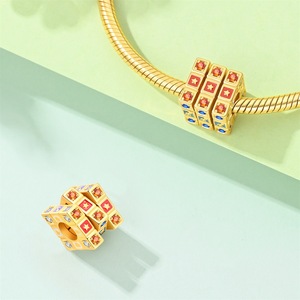<b>Cute</b> and playful jewelry made of white brass, including a mouse, heart, travel boat, Rubik's Cube, and compass pendant - Product Image 5