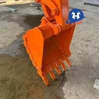 Mini-excavatrice sur chenilles Hitachi ZX65USB-5A d'occasion bien entretenue, modèle 2023, 6,5 tonnes, avec inspection vidéo du moteur, du pompe et des roulements hydrauliques.