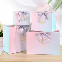 Sac cadeau haut de gamme de style européen et chinois avec dégradé rose, en matériau cartonné blanc, pour mariage et emballage de souvenirs