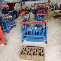 Machine de fabrication de briques de ciment de haute qualité Machine de fabrication de blocs de ciment creux Machine de moulage de blocs de sable manuelle