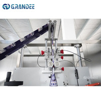 Appareil d'étiquetage automatique de haute précision pour bouteilles et canettes, applicateur de manchons thermorétractables en PVC pour bouteilles