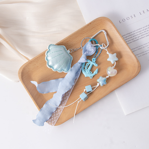 2026 Superventas Serie Oceánica de Verano: Llavero y Colgante para Bolso de Cuero PU con Diseño de Concha y Ancla de Barco de Acrílico, para Colgar en Mochilas Escolares de Estudiantes - Product Image 6