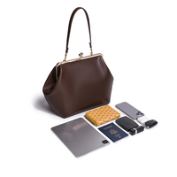 Sac fourre-tout et bandoulière de luxe léger vintage 2026 haut de gamme, modèle 2605, grande capacité, design élégant en forme de coquille, avec deux sangles et fermoir.