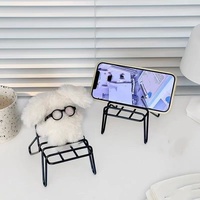 Support de téléphone et tablette en fer forgé, support paresseux à angle réglable, design évidé simple et créatif pour dissipation thermique