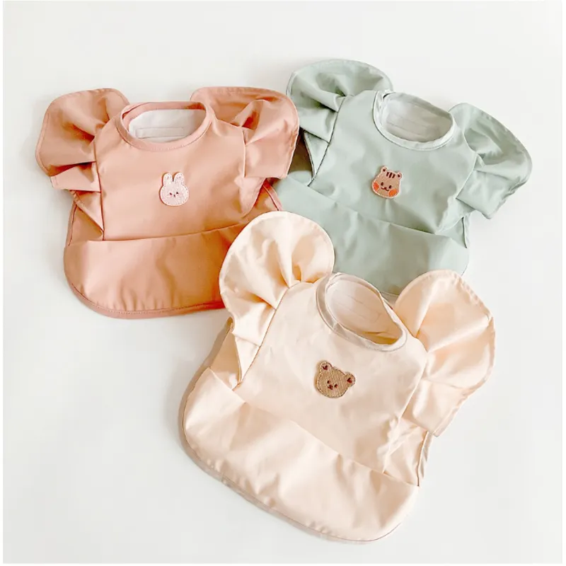 Bavoirs en PU doux pour bébé, poche d'alimentation d'ange, roter fille garçon, repas de bébé, bavoir imperméable, facile à nettoyer, mignon ours