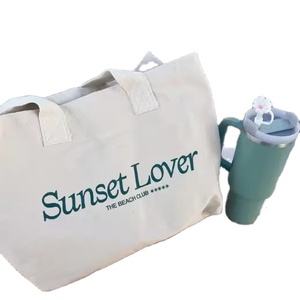 Sac fourre-tout de plage surdimensionné en toile de coton 12OZ avec cordon de serrage, motif lettres, logo et couleur personnalisables pour cadeaux et achats - Product Image 1