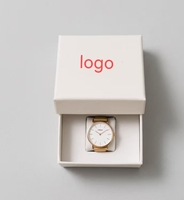 Montre-bracelet à quartz pour femme avec bracelet en maille dorée minimaliste, cadran blanc simple, boîte cadeau avec laminage mat et gaufrage