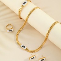 Ensemble de 4 colliers en acier inoxydable avec pendentifs lettre S et signe dollar, style Moyen-Orient