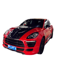 Nouveau remplacement pour le kit carrosserie en fibre de carbone Macan avec ailerons larges et diffuseur arrière pour voiture de sport (Chine)