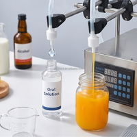 Machine de remplissage semi-automatique GFK-280 pour eau, jus, lait, huile |   Machine de remplissage de boissons en acier inoxydable à 2 buses