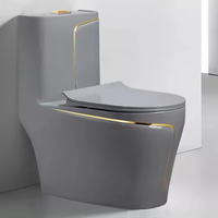 Sanitaires WC modernes monobloc, design de luxe, céramique, salle de bain, WC, cuvette de toilette de couleur or et blanc