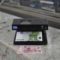 Détecteur de billets de banque portable léger en plastique DC-2138-D EB avec loupe 5x et règle de mesure