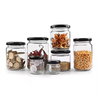 Bocaux en verre personnalisés en gros vides de 30 ml à 1000 ml pour le stockage du miel et de la confiture avec des couvercles en fer blanc doré et noir
