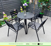 Ensemble table et chaises de salle à manger modernes en acier au carbone pour l'extérieur, avec design durable et imperméable, idéal pour balcon, patio, parc