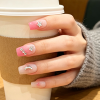 Ongles press-on carrés courts rose ombré en ABS avec nœud 3D, strass et breloques cœur pour doigts