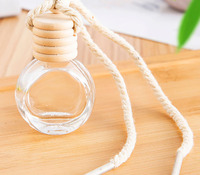 Diffuseur rechargeable de 10 ml avec bouchon en bois naturel, flacon de parfum rond à suspendre dans la voiture avec corde tressée