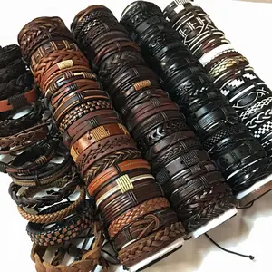 Braccialetti in vera pelle intrecciati intrecciati con polsino intrecciato regolabile etnico all'ingrosso di perline di legno tribali per uomo