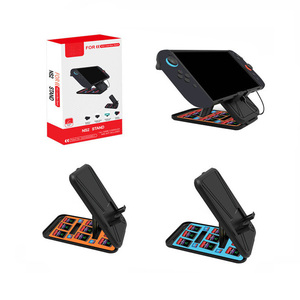 Supporto per supporto 2 in 1 + scatola di immagazzinaggio per cartucce di carte di gioco per interruttore Nintendo 2 <span class=keywords><strong>OLED</strong></span> Lite supporto per <span class=keywords><strong>staffa</strong></span> Dock - Product Image 1