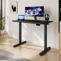 Bureau électrique assis-debout à cadre noir et finition bois, plateau deux pièces, hauteur réglable, moteur simple, 2 niveaux, pour bureau