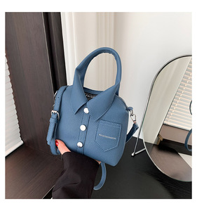 Borsa a tracolla da donna 2025 nuova, casual, alla moda, a forma di camicia, in pelle PU, con cerniera e bottone, design innovativo, con manico superiore, per signore - Product Image 1