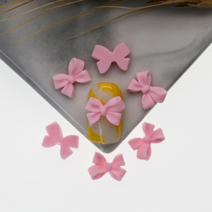 100 pièces/sac nœud papillon Nail Art décorations résine arc couleur pièces Mini nœud ruban Nail Art <span class=keywords><strong>strass</strong></span> ongles breloques déco pièces - Product Image 4