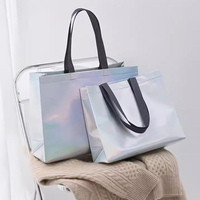 Sacs de shopping non-tissés portables à bandoulière longue avec imprimés animaux laser pour emballage de vêtements féminins stylés