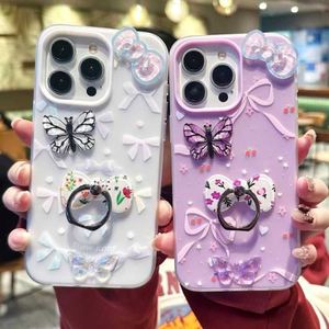 เคสโทรศัพท์แบบ 2-in-1 ลายผีเสื้อพร้อมขาตั้งในตัว สำหรับ iPhone 17 Air 16 15 14 Plus 13 12 11 Pro XS MAX  พร้อมจี้โบว์หลากสีสัน - Product Image 4
