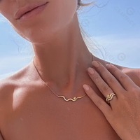 Parure de bijoux Gemnel en argent 925 avec diamant CZ en forme de poire, pendentif courbe fluide, collier, boucles d'oreilles pendantes et bague empilable