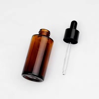 Bouteille en verre givré de forme ronde pour emballage personnalisé de sérum cosmétique, soins de la peau, huile essentielle