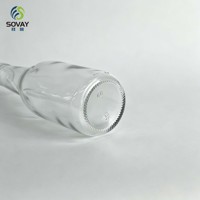 Bouteille en verre transparente vide de 235 ml pour boissons, idéale pour l'embouteillage commercial, la présentation de la marque et le stockage quotidien de liquides