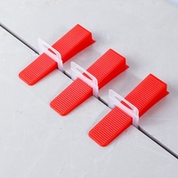 Système de nivellement de carreaux en plastique, système de nivellement de carreaux en céramique, clips, cales, entretoises et pinces pour système de nivellement de carreaux