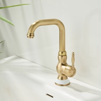 Robinet de lavabo de salle de bain WEIHAO en laiton poli doré avec poignée en céramique blanche, mitigeur eau chaude et froide monotrou