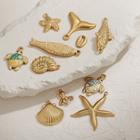 Vente en gros de pendentifs de la série Golden Ocean en acier inoxydable Collection Queue Étoile de mer Coquillage fait à la main DIY Collier Bijoux Accessoires