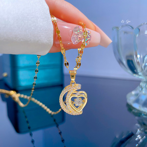 Venta al por mayor delicado Acero inoxidable media luna medio corazón forma collar Micro pavimentado collar de circón cúbico - Product Image 1