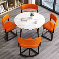 La chaise moderne nordique de table à manger de restaurant place la conception ronde durable pour l'usage occasionnel de balcon d'appartement