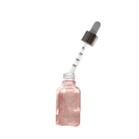 Flacon compte-gouttes rose vide et transparent de 20ml pour huile de pilosité faciale de conception personnalisée d'essence de verre d'huile essentielle à pompe liquide