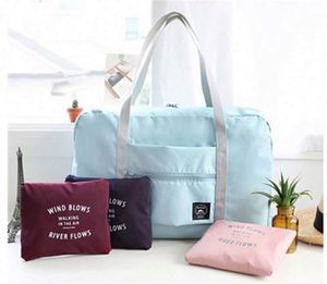 Muestra gratuita, bolsa de viaje plegable de poliéster ligera, impermeable y resistente a desgarros, con logo personalizado, para almacenamiento y fin de semana. - Product Image 2