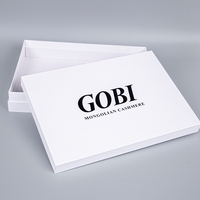Boîtes d'expédition personnalisées en papier recyclable de qualité supérieure avec gaufrage et pelliculage mat, fermeture magnétique et ruban