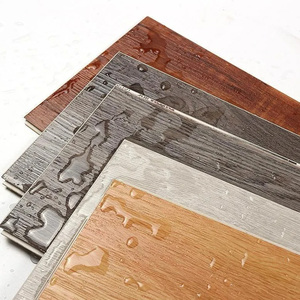 Tablón de madera gris impermeable de alto brillo <span class=keywords><strong>PVC</strong></span> DIY suelo de vinilo <span class=keywords><strong>flotante</strong></span> Uniclic <span class=keywords><strong>Click</strong></span>/pegamento/parte posterior seca/<span class=keywords><strong>Sistema</strong></span> de clic autoadhesivo - Product Image 1