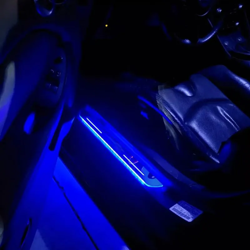 Striscia del davanzale della portiera della macchina luci ambientali colorate luci Decorative interne luminose magnetiche pedale di benvenuto