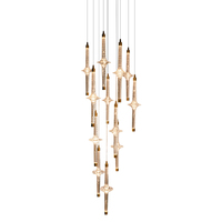 Luminaire suspendu moderne en cristal transparent cannelé avec disque étoilé pour hall d'entrée et escalier à haut plafond de prestige