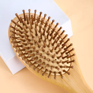 หวีไม้สำหรับนวดผม ทรงรี ด้ามไม้ไผ่ แปรงดูแลหนังศีรษะ - Product Image 1