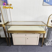 Comptoir de présentation de bijoux en or directement de l'usine avec éclairage LED et service de logo personnalisé pour les magasins de détail et salles d'exposition