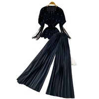 Ensemble pantalon plissé et haut court à manches courtes en mousseline de soie, orné de perles et de pompons, style socialite élégant et ample pour femme