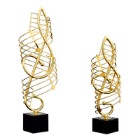 Décoration d'intérieur, sculpture en métal dorée de clé de sol de luxe avec base en marbre noir, sculpture de note de musique