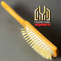 Peigne en bambou et brosse à cheveux noire avec logo personnalisé Ensemble d'outils de massage pour thérapie du bois naturel Ensemble de soins capillaires en bois simple