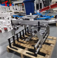 Palettiseur robotisé en acier inoxydable fabriqué en Chine avec moteur PLC et bras à boîte de vitesses, système de palettisation de préhension et de placement