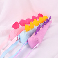 Vente en gros de nouveau design de queues de dinosaure en peluche souple personnalisée pour les enfants fête d'anniversaire accessoires de performance sac d'emballage